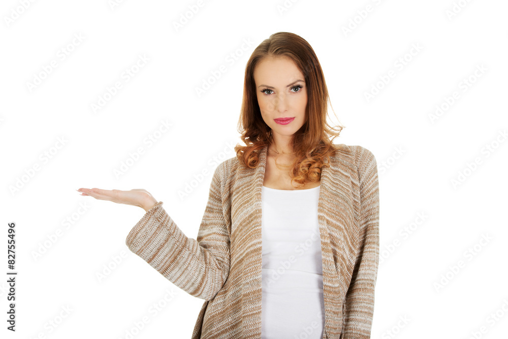 Beautiful woman showing empty hand. Beautiful woman showing empty hand.