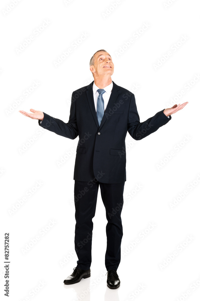 Full length businessman with hands open gesture Full length businessman with hands open gesture