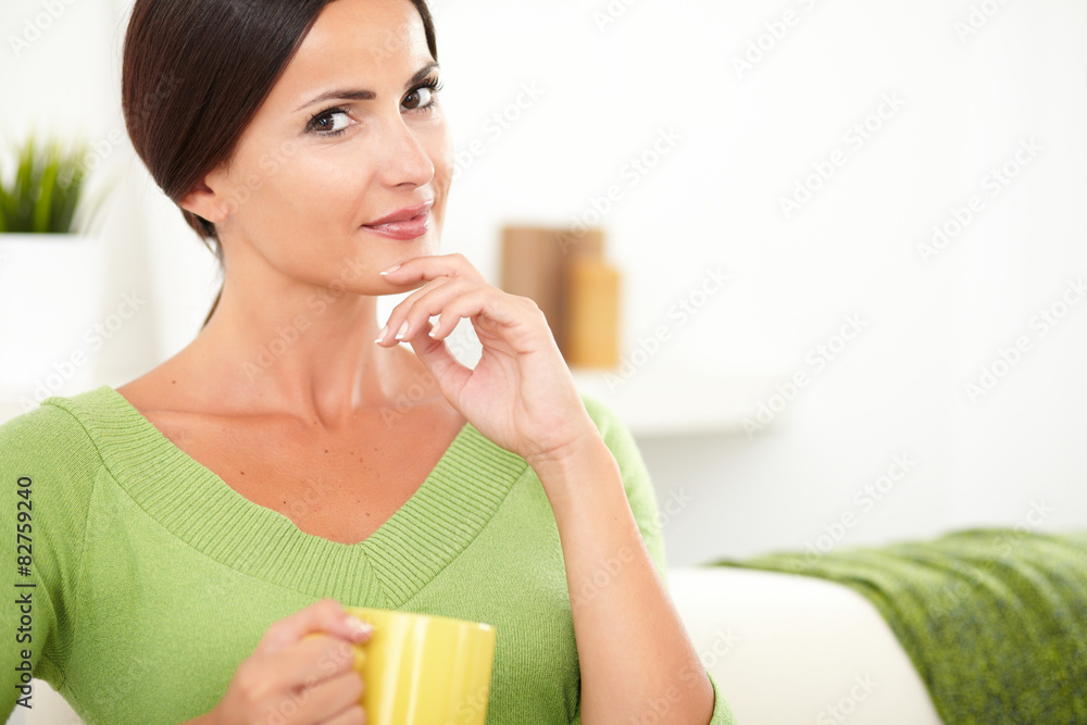 Thoughtful woman looking at the camera