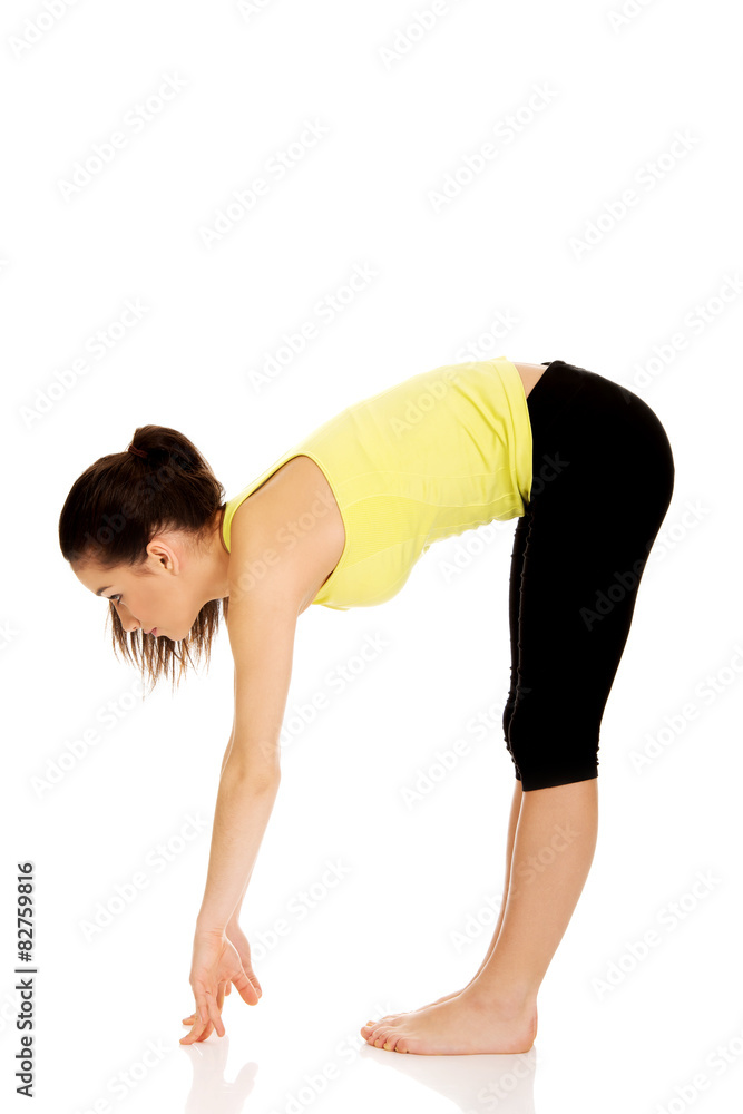 Fitness woman doing stretching exercise. Fitness woman doing stretching exercise.
