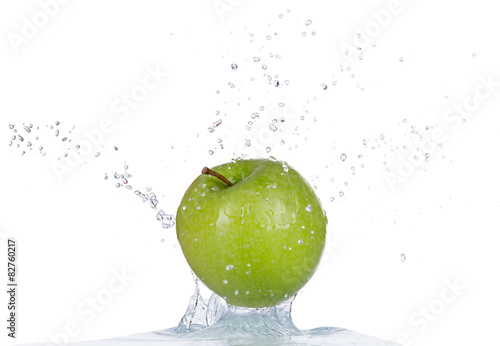 Fresh apple in water splash on white background