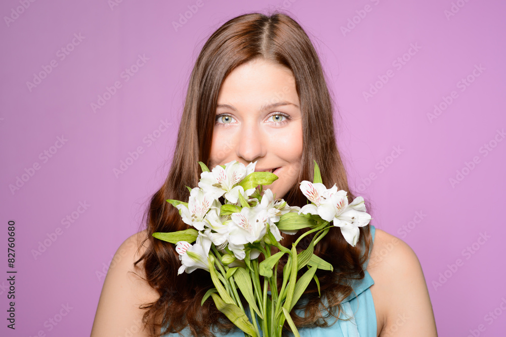 beautiful woman holding white flowers