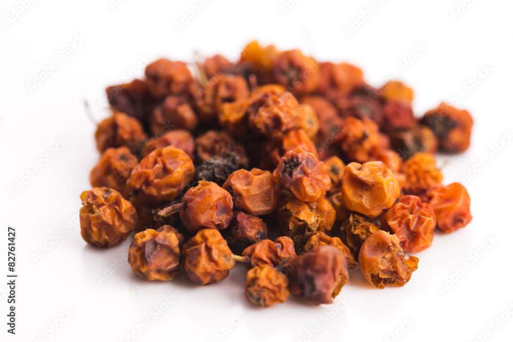 Dried rowan berries on a white background Dried rowan berries on a white background