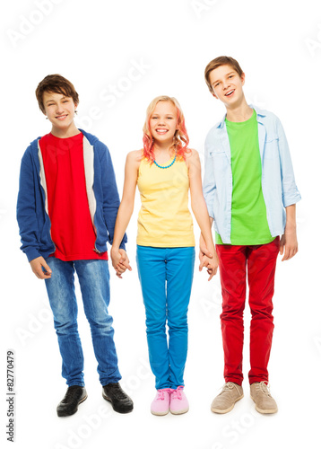 Nice young teens boys and girl hold hands