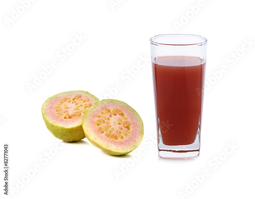 a glass of pink guava juice on white background