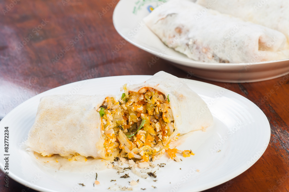 fresh made lumpia or mixed vegetable on a rice wrap fresh made lumpia or mixed vegetable on a rice wrap