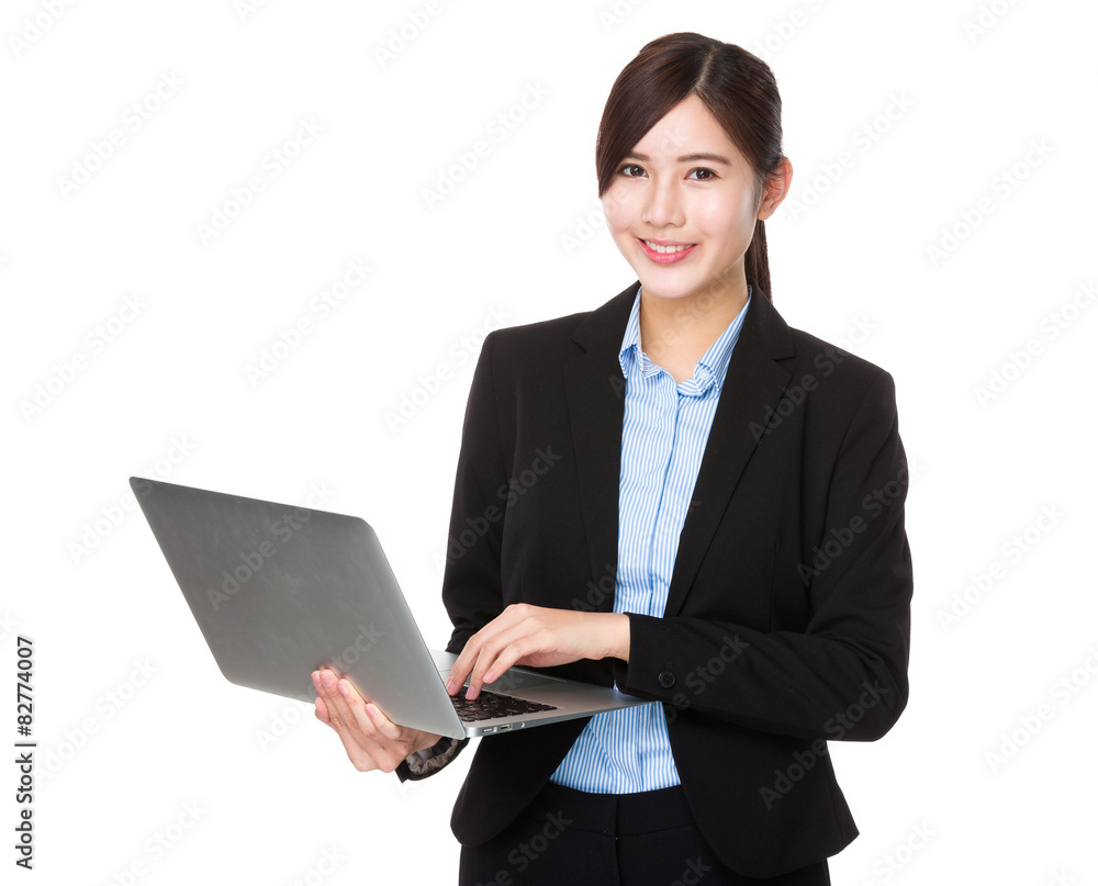 Asian businesswoman use of laptop computer Asian businesswoman use of laptop computer