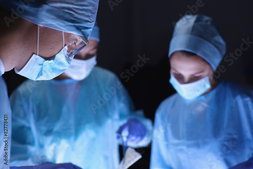 Team surgeon at work in operating