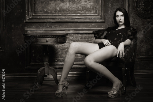Sensual girl in the vintage interior