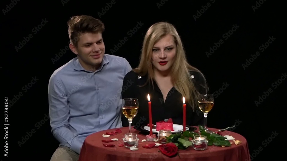 romantic young couple in love on a date sitting in a cafe, Slow romantic young couple in love on a date sitting in a cafe, Slow