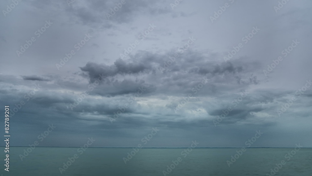 custom made wallpaper toronto digitalThe picturesque landscape with dark puffy clouds above the sea. Time lapse. Shot with Red Cinema Camera