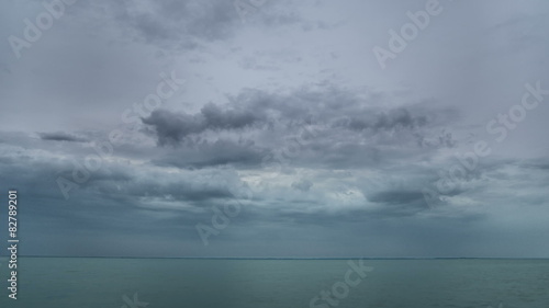 Wallpaper Mural The picturesque landscape with dark puffy clouds above the sea. Time lapse. Shot with Red Cinema Camera Torontodigital.ca
