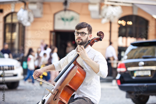 guy who plays the cello at street in summer