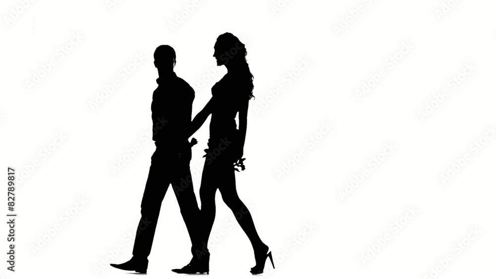 Silhouette of couple in love, Love and sensuality. Slow motion Silhouette of couple in love, Love and sensuality. Slow motion