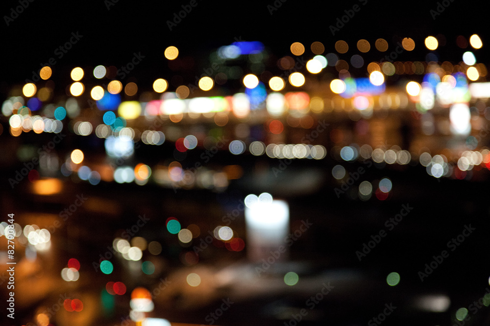 colorful bright lights on dark night background colorful bright lights on dark night background