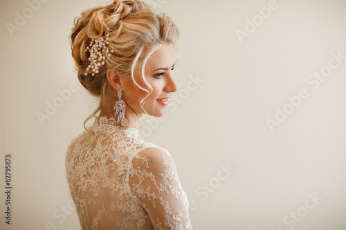Fototapeta Beautiful bride wedding makeup hairstyle marriage