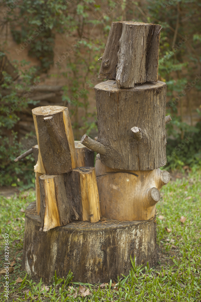 Fototapeta premium Piled stump seats in garden or park