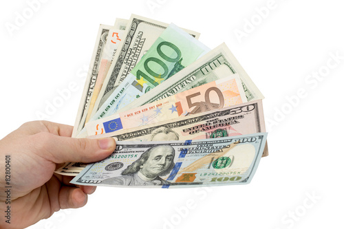 Money in hand on a white background
