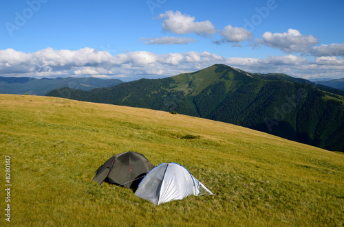 Two tents in mountains