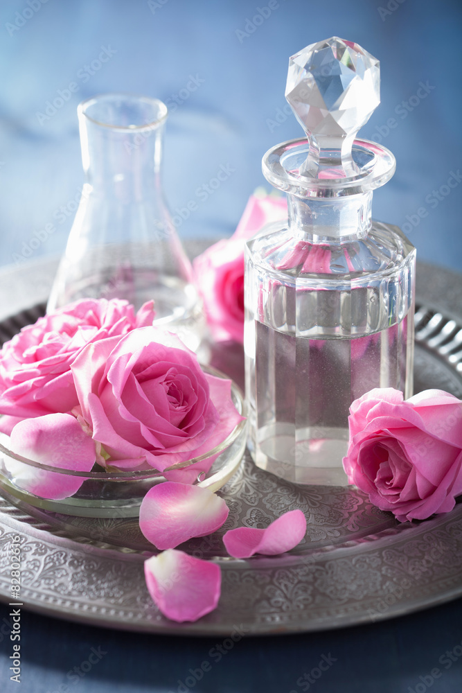 aromatherapy set with rose flowers and flasks aromatherapy set with rose flowers and flasks