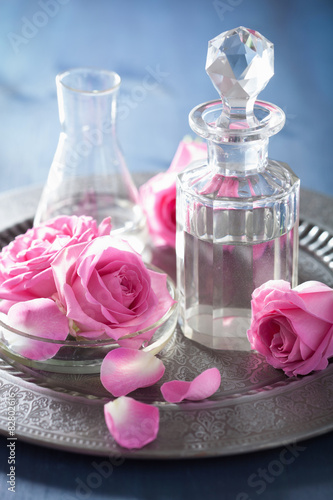 aromatherapy set with rose flowers and flasks