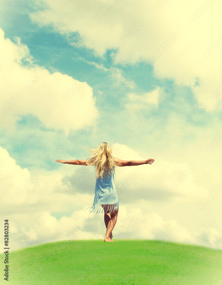 girl stands on a hill outstretched hand girl stands on a hill outstretched hand