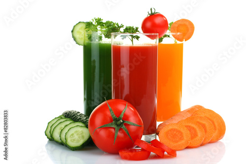 Fresh vegetable juices isolated on white