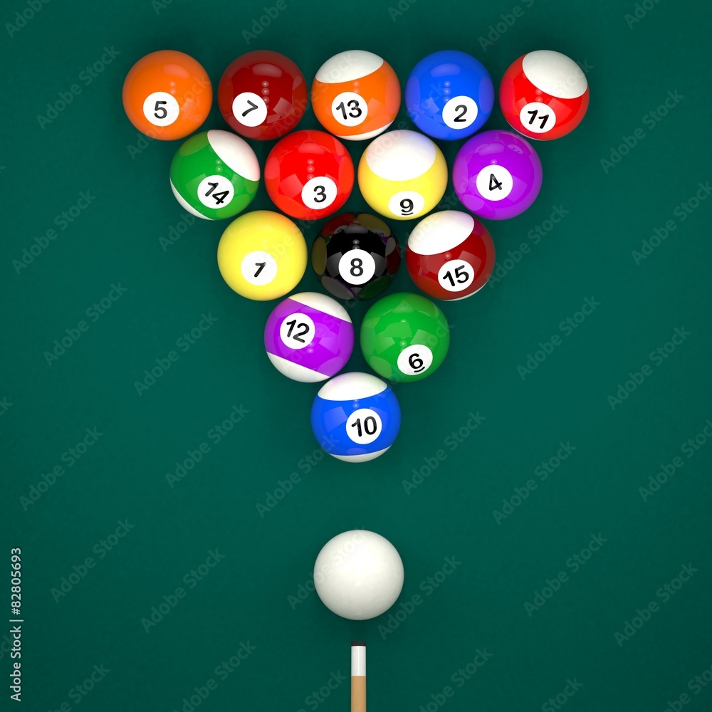 Placed billiard balls on table with cue on green table Placed billiard balls on table with cue on green table