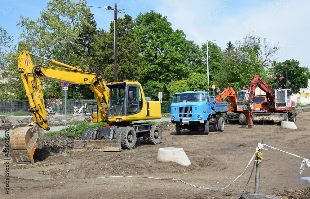 Excavators and truck at the road construction