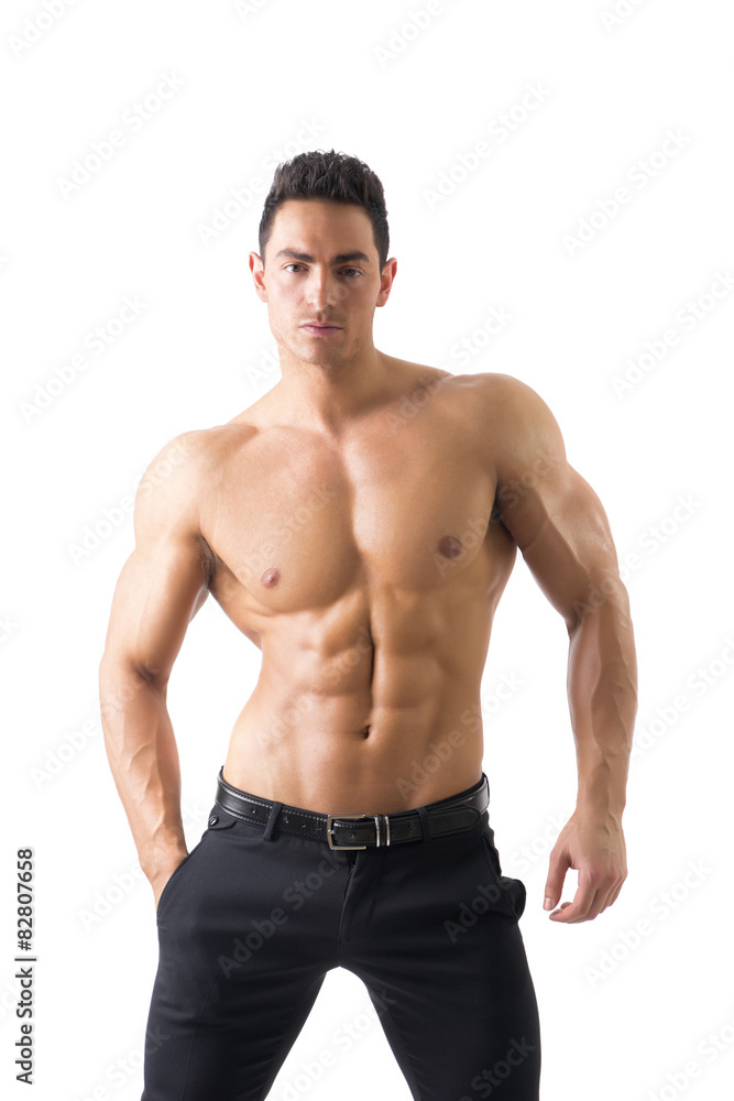 Handsome topless muscular man standing, isolated