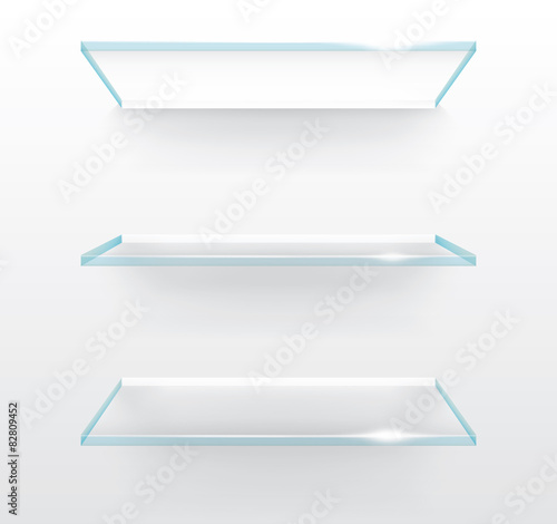 Empty glass shelves on wall vector