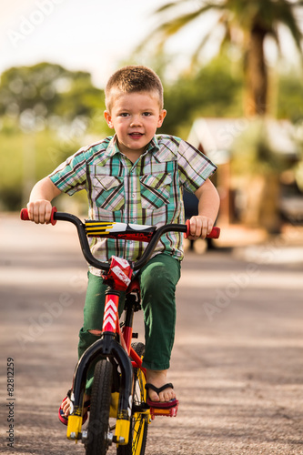 Fototapeta Naklejka Na Ścianę i Meble -  Boy On a Bike