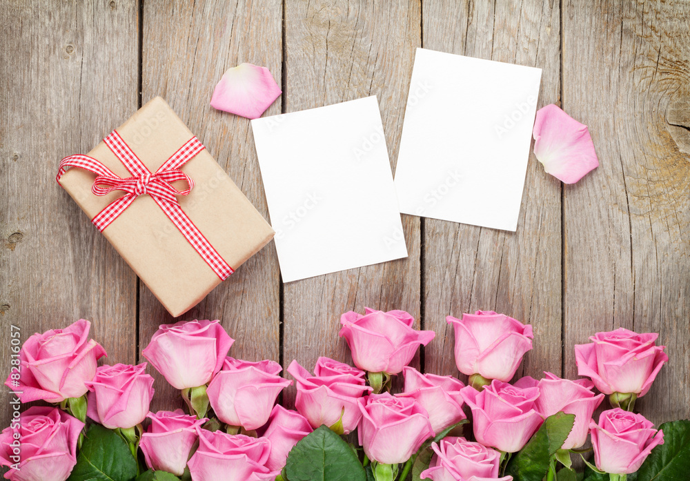 Photo frames, gift box and pink roses Photo frames, gift box and pink roses