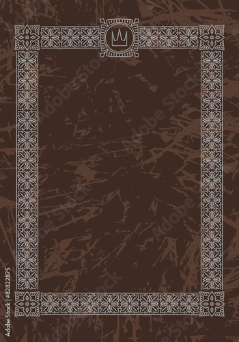 Luxury, ornate, vintage frame with crown on aged dark brown back