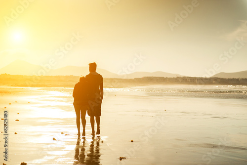 silhouettes of a couple at beach 
