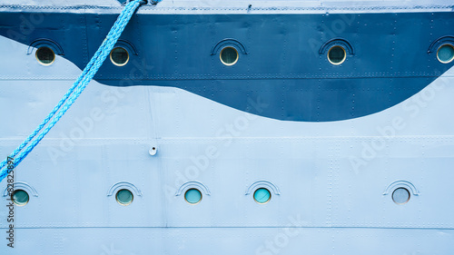 Closeup of ship with hanging mooring rope © Voyagerix