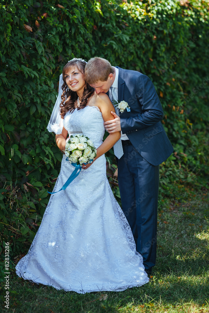 Bride and Groom at wedding Day walking Outdoors on spring nature