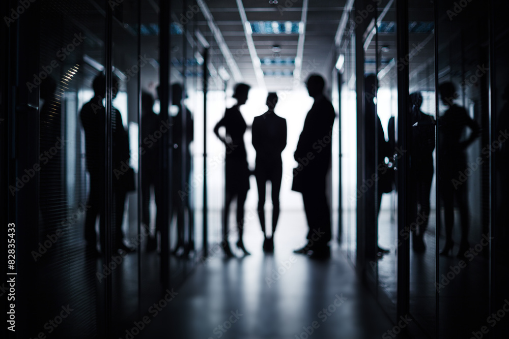 Business team in corridor Business team in corridor