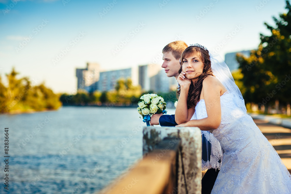 Bride and Groom at wedding Day walking Outdoors on spring nature Bride and Groom at wedding Day walking Outdoors on spring nature