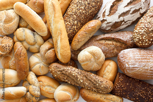 Photos Many mixed breads and rolls shot from above.