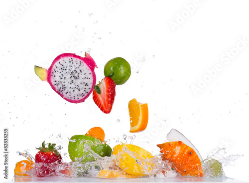 Fototapeta Naklejka Na Ścianę i Meble -  Mix fruit in water splashes on white background