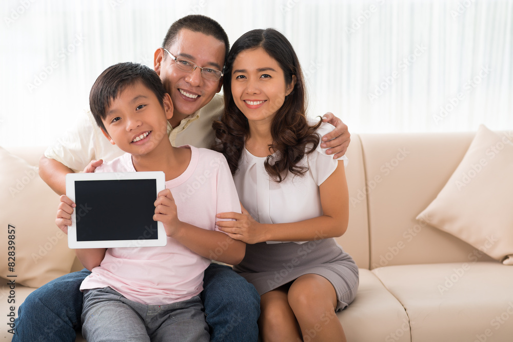 Family with digital tablet Family with digital tablet