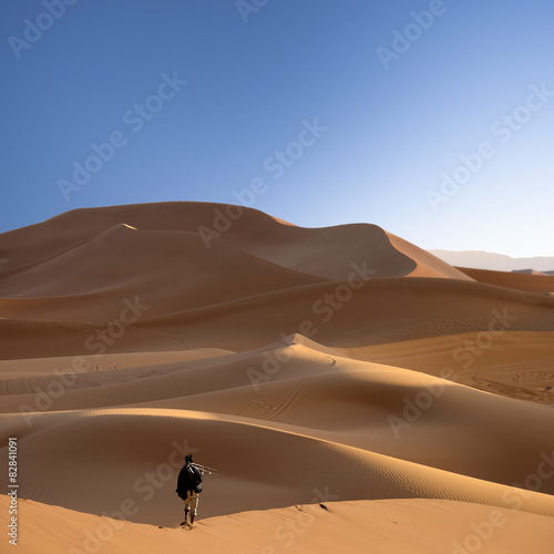 photographer in the sahara desert, morocco