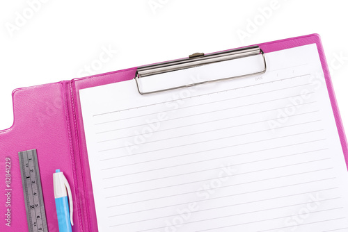 Blank pink clipboard with pen and ruler  isolated on white with