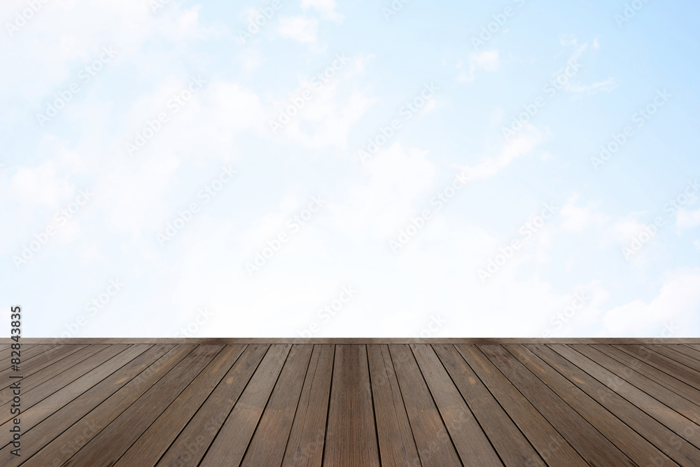 Wood and Grass patch on the sky background.