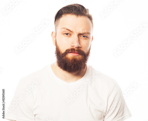 Stylish bearded man in white shirt. 