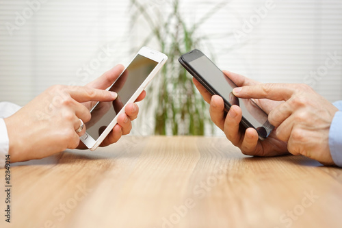 Photography woman and man using applications together on mobile smart phone
