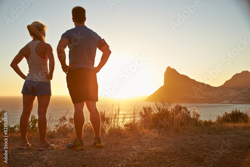 Man and woman contemplating after jogging