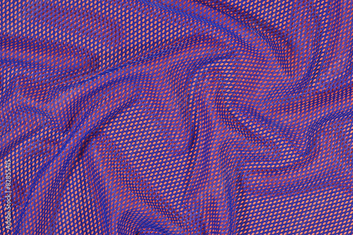 Blue crumpled nonwoven fabric on a orange