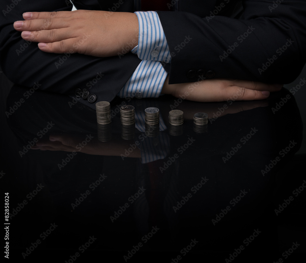 Close-up Of Businessman with Coins